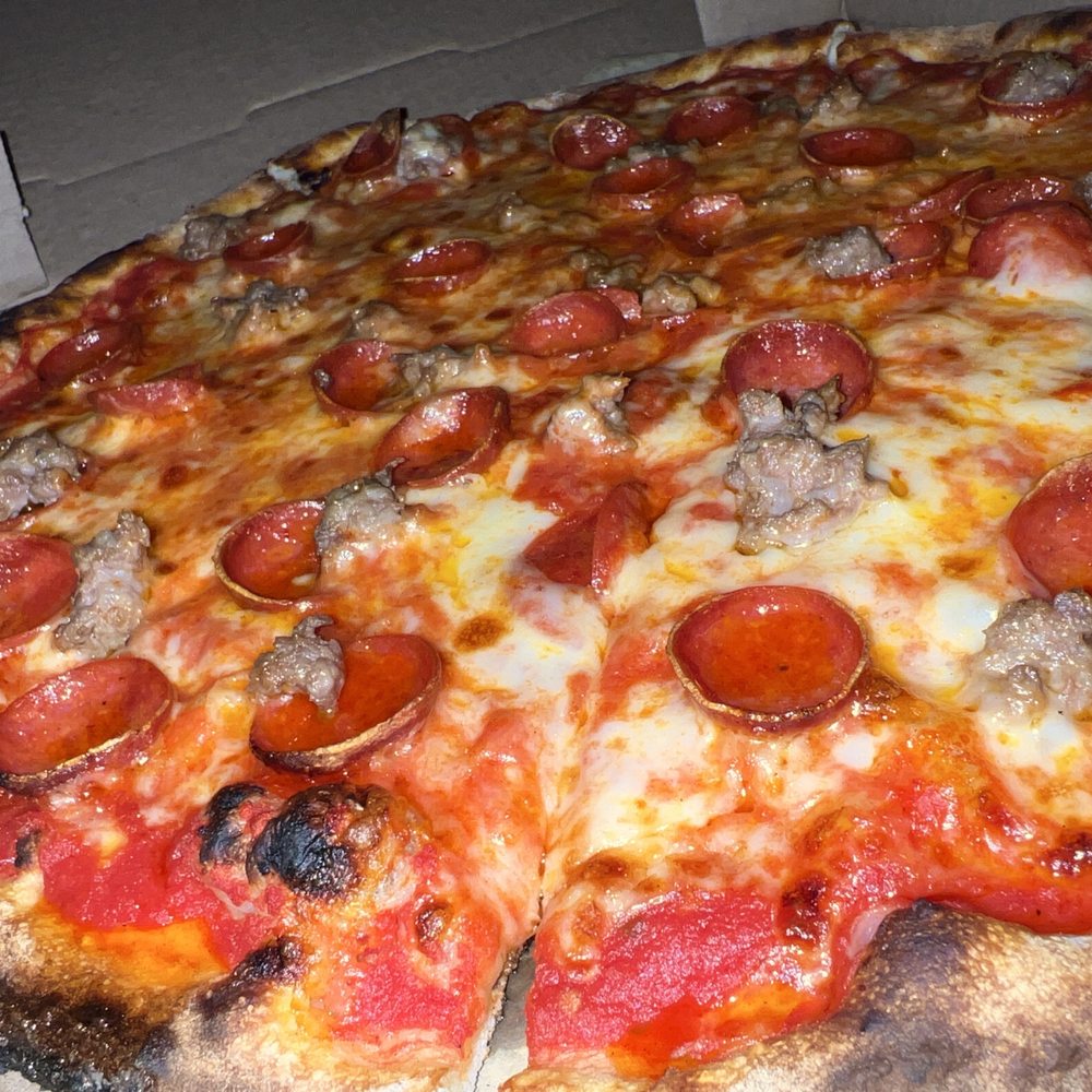 Posto Pizza - Delicious pepperoni pizza + italian sausage - Pizza Near Me - Celebration, Florida Posto Pizza - Delicious pepperoni pizza + italian sausage - Pizza Near Me - Celebration, Florida