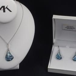Rios Jewelers - Blue Topaz pendant and earring set