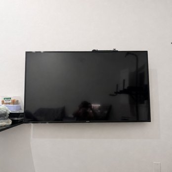Apex Home Services - The technician mounted the TV on the wall - Handyman Near Me Apex Home Services - The technician mounted the TV on the wall - Handyman Near Me