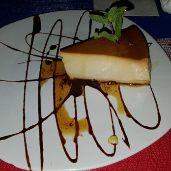 Pochos Seafood - Flan dessert.. so creamy and delish! - Mexican Near Me - Marina, BCS Pochos Seafood - Flan dessert.. so creamy and delish! - Mexican Near Me - Marina, BCS