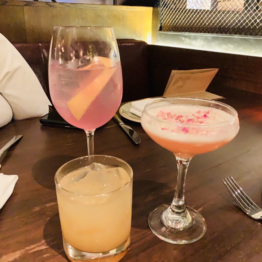 Gypsy Kitchen - 50 Shades of Purple (tall drink), The Seville Rose (pretty drink with rose on top) last one is a margarita (yellow) - Spanish Near Me - Atlanta, Georgia Gypsy Kitchen - 50 Shades of Purple (tall drink), The Seville Rose (pretty drink with rose on top) last one is a margarita (yellow) - Spanish Near Me - Atlanta, Georgia
