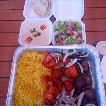 Baba K - Combo for two. Beef and chicken with rice, tomatoes, salad, hummus and pita. So good! - Mediterranean Near Me - Rancho Cucamonga, California Baba K - Combo for two. Beef and chicken with rice, tomatoes, salad, hummus and pita. So good! - Mediterranean Near Me - Rancho Cucamonga, California