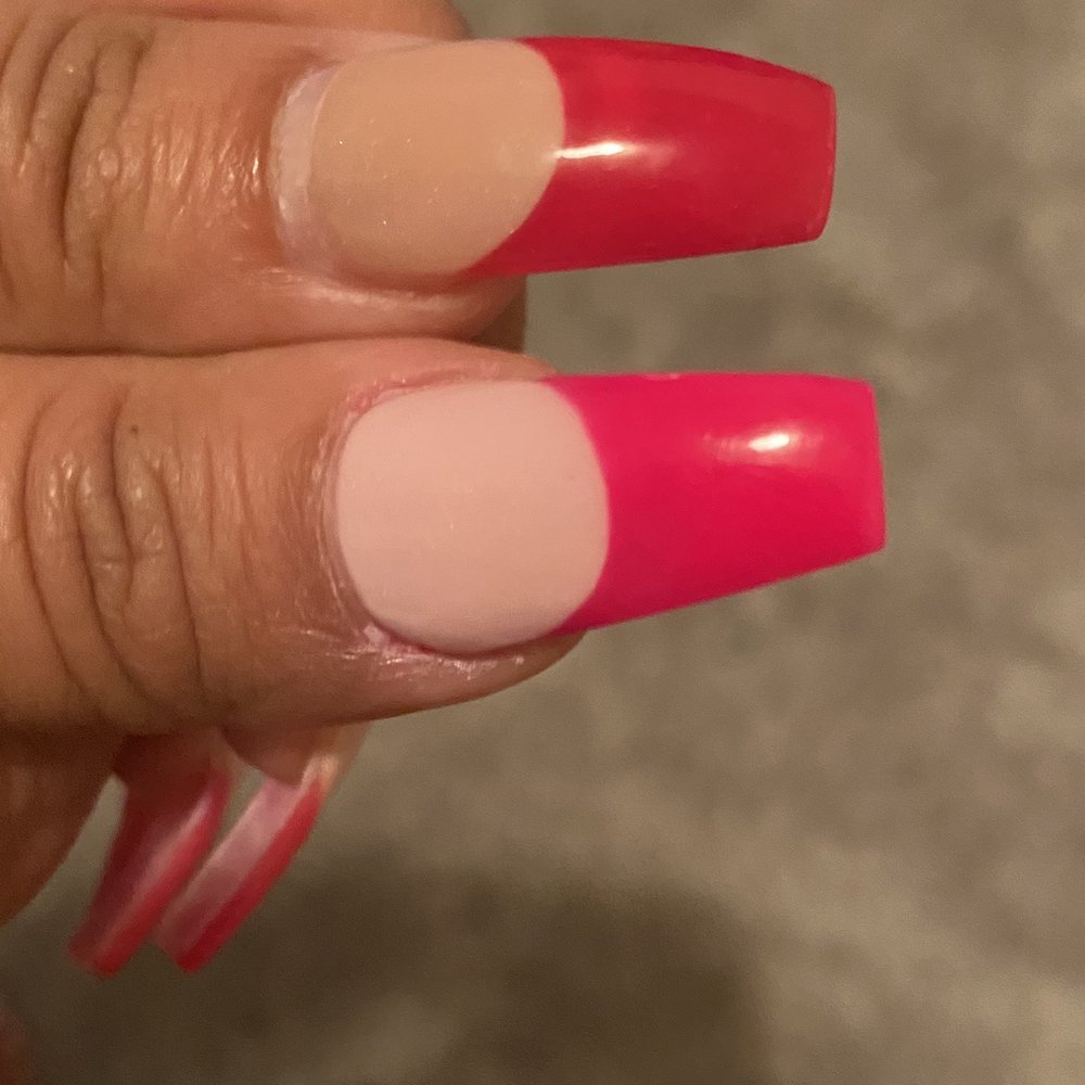 Color is completely different. One nail is also longer than the other and she said she would do a fill for me but reneged.