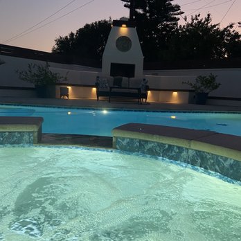 Tropical Breeze Custom Pools - Nighttime pool and spa lighting by Tropical Breeze - Pool & Hot Tub Service Near Me Tropical Breeze Custom Pools - Nighttime pool and spa lighting by Tropical Breeze - Pool & Hot Tub Service Near Me