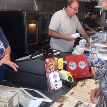 From Philly - Picture of the owner. The man that was eating while handling food with no gloves on. ‍ - Cheesesteaks Near Me - Costa Mesa, California