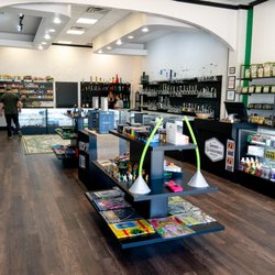 Smokin Glassworks- Cross Roads - Right as you enter, the plethora of smoking accessories, tobacco products and hemp items are waiting for you to take 'em home.