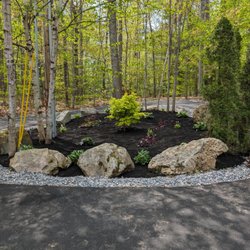 Mitchell Masonry - Bed Makeover! We added new mulch, plants and a centerpiece maple to give this bed a new look.