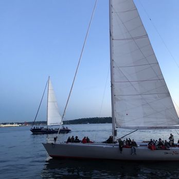 Six Seven Restaurant - Sail boats passing during dinner - New American Near Me - Seattle, Washington Six Seven Restaurant - Sail boats passing during dinner - New American Near Me - Seattle, Washington