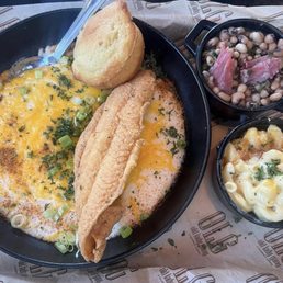 Fish and grits with black eyes peas and macaroni and cheese