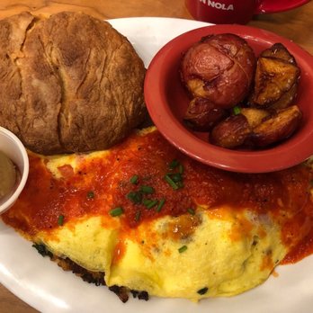 Ruby Slipper Decatur - Spanish Omelette with a side of potatoes and a biscuit. - Breakfast & Brunch Near Me - New Orleans, Louisiana Ruby Slipper Decatur - Spanish Omelette with a side of potatoes and a biscuit. - Breakfast & Brunch Near Me - New Orleans, Louisiana