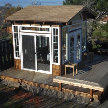 Bumble Bee Construction - Sun Room - After Construction (with deck, built-in bench, and stairs) - General Contractors Near Me