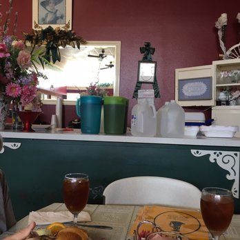 Victorian Lady Tea Room - a woman sitting at a table with a plate of food - Tea Rooms Near Me - Mabank, Texas Victorian Lady Tea Room - a woman sitting at a table with a plate of food - Tea Rooms Near Me - Mabank, Texas