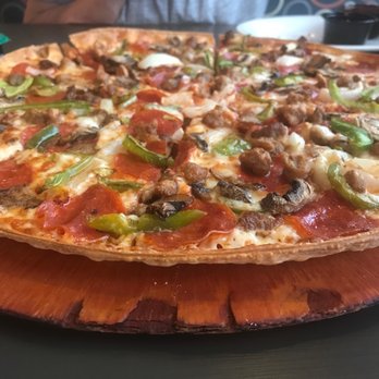 Pizza Hut - a man taking a picture of a pizza - Pizza Near Me - Vandalia, Ohio Pizza Hut - a man taking a picture of a pizza - Pizza Near Me - Vandalia, Ohio