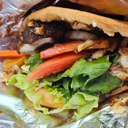 Allwyn's Bakery - Jerk Pork Sandwich with Lettuce, Tomatoes & Cheese  https://www.instagram.com/the.wanderin.foodie/