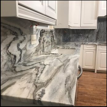 Lifetime Cabinets & Countertops - Veins lined up perfectly with full backsplash - Cabinetry Near Me - Columbia, South Carolina