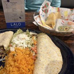 Steak and Cheese Quesadilla with rice , pico de gallo , lettuce , and sour cream Steak and Cheese Quesadilla with rice , pico de gallo , lettuce , and sour cream