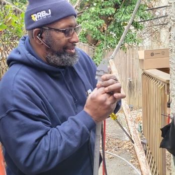 RBJ Electric - Preparing the service cable for attachment. - Electricians Near Me RBJ Electric - Preparing the service cable for attachment. - Electricians Near Me