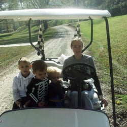Ashland Daily Independent - Mommy and boys riding the golf cart she loves doing things with her boys she is a wonderful Mother