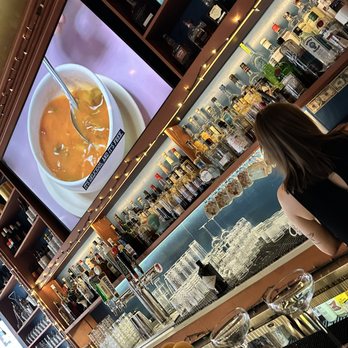 The Dandy Crown - Bar shot; please change the channel tho - Cocktail Bars Near Me - Chicago, Illinois