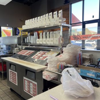 Zero Degrees - Empty drink dispensers in the background and food prep board. - Bubble Tea Near Me - Summerlin, Nevada Zero Degrees - Empty drink dispensers in the background and food prep board. - Bubble Tea Near Me - Summerlin, Nevada