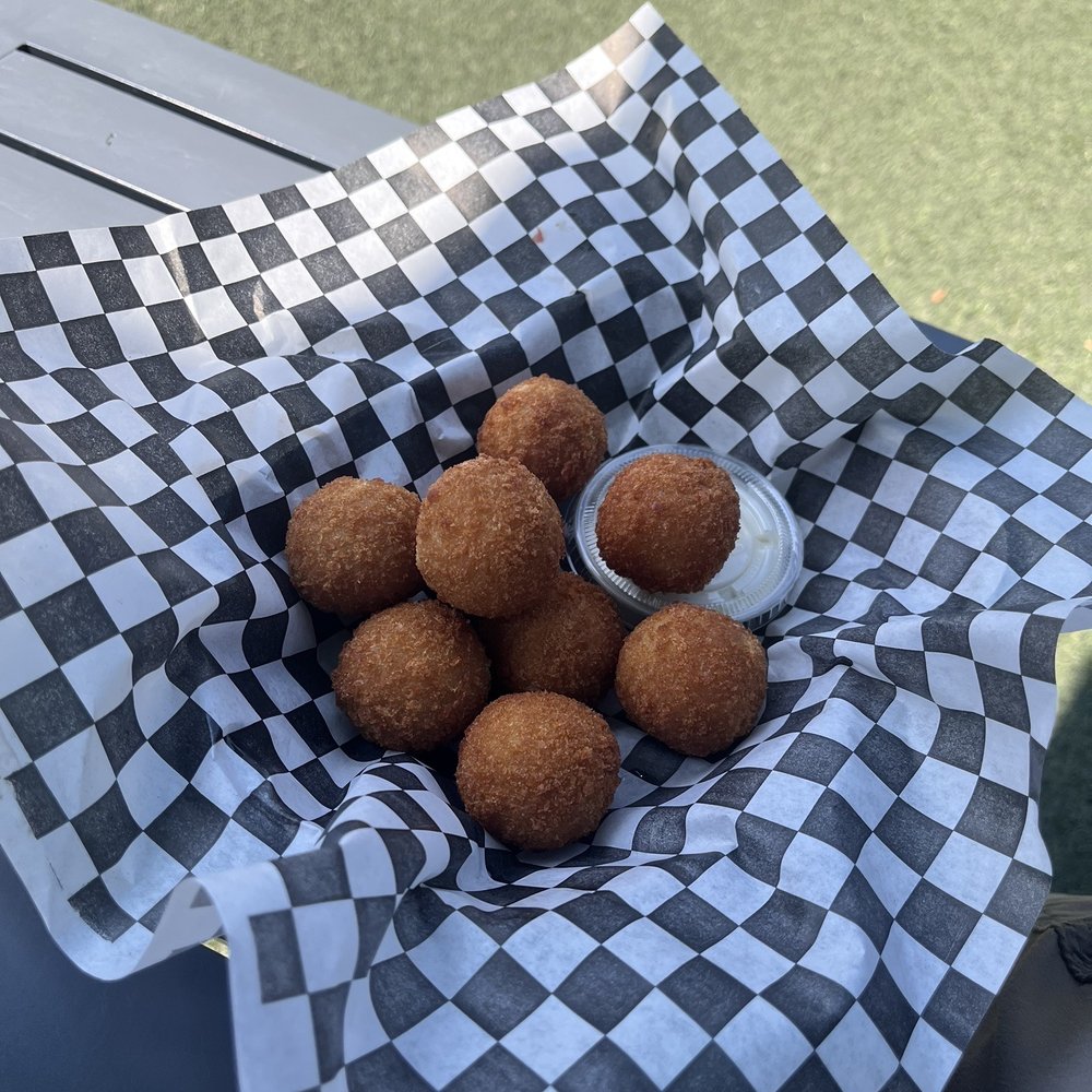 a basket of fried meatballs a basket of fried meatballs