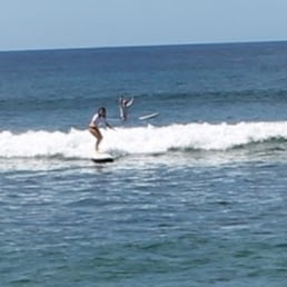 Learned how to surf with surf dog maui :)