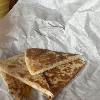 Mexi's Fresh Express - a little girl eating a quesadilla - Mexican Near Me - Moncton, New Brunswick