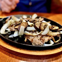 Alejandro's Mexican Restaurant - Carne asada with onions & mushrooms on a sizzling plate. Superb. So tenter you can cut it with a fork. Winners Circle :)..