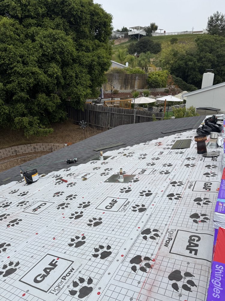 Slide of Mister Roofing