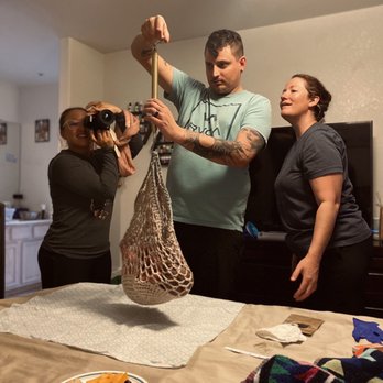 Emergence - Weighing baby girl - Midwives Near Me