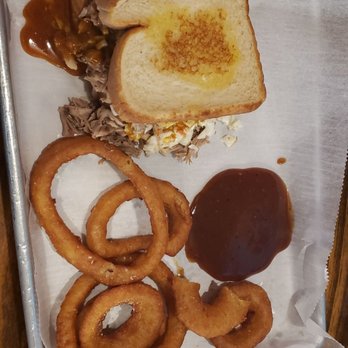 Smitty's Lockdown BBQ - Pulled pork sandwich with coleslaw and onion rings - Chicken Wings Near Me - Marietta, Georgia Smitty's Lockdown BBQ - Pulled pork sandwich with coleslaw and onion rings - Chicken Wings Near Me - Marietta, Georgia