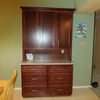 Cabinetfacers - Custom built Cherry wood cabinet with quartz counter top (color: New Quay) - Cabinetry Near Me