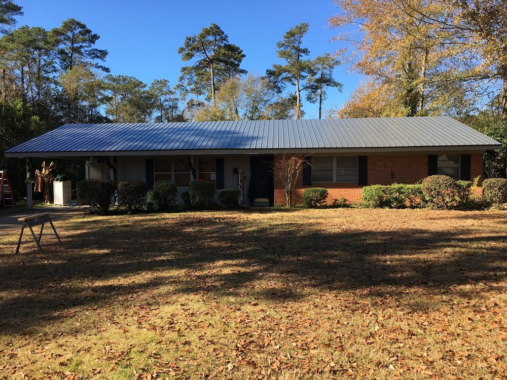 Slide of Magnolia Roofing & Construction