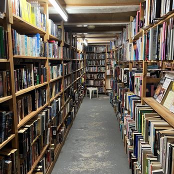 The Book Exchange - Sci-fi and fantasy on the left and back - Bookstores Near Me - Amsterdam, New Hampshire
