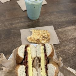 Spielman Bagels and Coffee Roasters - Bagel sandwich, hash brown, and matcha latte.