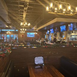 Inside dining (there is plenty of outside dining with TVs too) Inside dining (there is plenty of outside dining with TVs too)