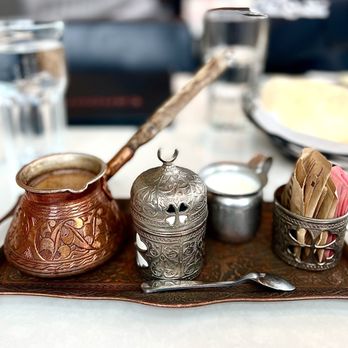 Tanoor - Turkish Coffee with Cardamom in their traditional Turkish coffee set. Reg or Decaf. Excellent Lots of dredge at the bottom. $5.    5* - Lebanese Near Me - Sammamish, Washington