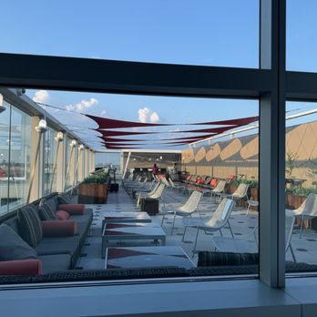 Delta Sky Club - Outdoor seating in Sky Deck - Airport Lounges Near Me - Jamaica, New York