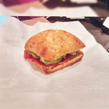 Equivita - Muffuletta Sandwich (salami, capicola, goat cheese, avacado, artichokes and olive muffuletta on ciabatta) - Trainers Near Me - Columbus, Ohio