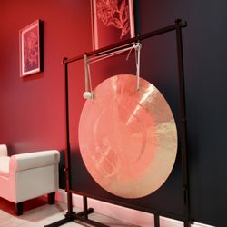 OxygenWell Hyperbaric and Regenerative Medicine Center - A little light and harmony from our red and infrared light bed shining over our custom gong.