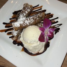 Lumpia with bananas and Nutella filling. Along side vanilla ice cream!!!!!!! Delicious Lumpia with bananas and Nutella filling. Along side vanilla ice cream!!!!!!! Delicious