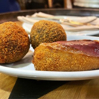 Bar del Pla - Squid ink (round) and duck croquettes - Tapas Bars Near Me - Barcelona, B Bar del Pla - Squid ink (round) and duck croquettes - Tapas Bars Near Me - Barcelona, B