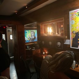 a woman sitting at a bar a woman sitting at a bar