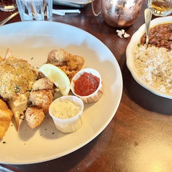 Pappadeaux Seafood Kitchen - Catfish Stuffed Crab Combo  which has friday shrimp, fried catfish , stuff crab and rice and Red Beans & Rice . - Seafood Near Me - Houston, Texas