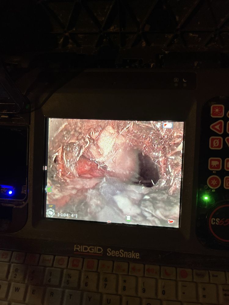 Slide of Maine Drain Busters