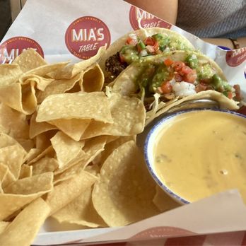 Mia's Table - Flat Iron Steak Taco Shrimp Taco Chips and Queso - American Near Me - Houston, Texas Mia's Table - Flat Iron Steak Taco Shrimp Taco Chips and Queso - American Near Me - Houston, Texas