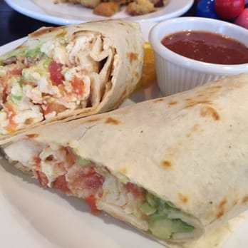 Famous Toastery - Egg white wrap with avocado, tomato and Brie. Side of house made salsa - Breakfast & Brunch Near Me - Concord, North Carolina