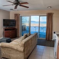 Beachcomber Inn - Lake level one bedroom units sleep 4, have full kitchens, and lake views. This couch has a pull out air mattress.