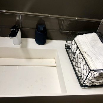 Eden - Actual towels in the bathroom. Love this idea because it doesn't waste paper towels. - American Near Me - Syracuse, New York