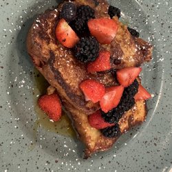 Bay Restaurant - French toast ~€13, moist, had syrup and berries. Honey and bacon is another option.